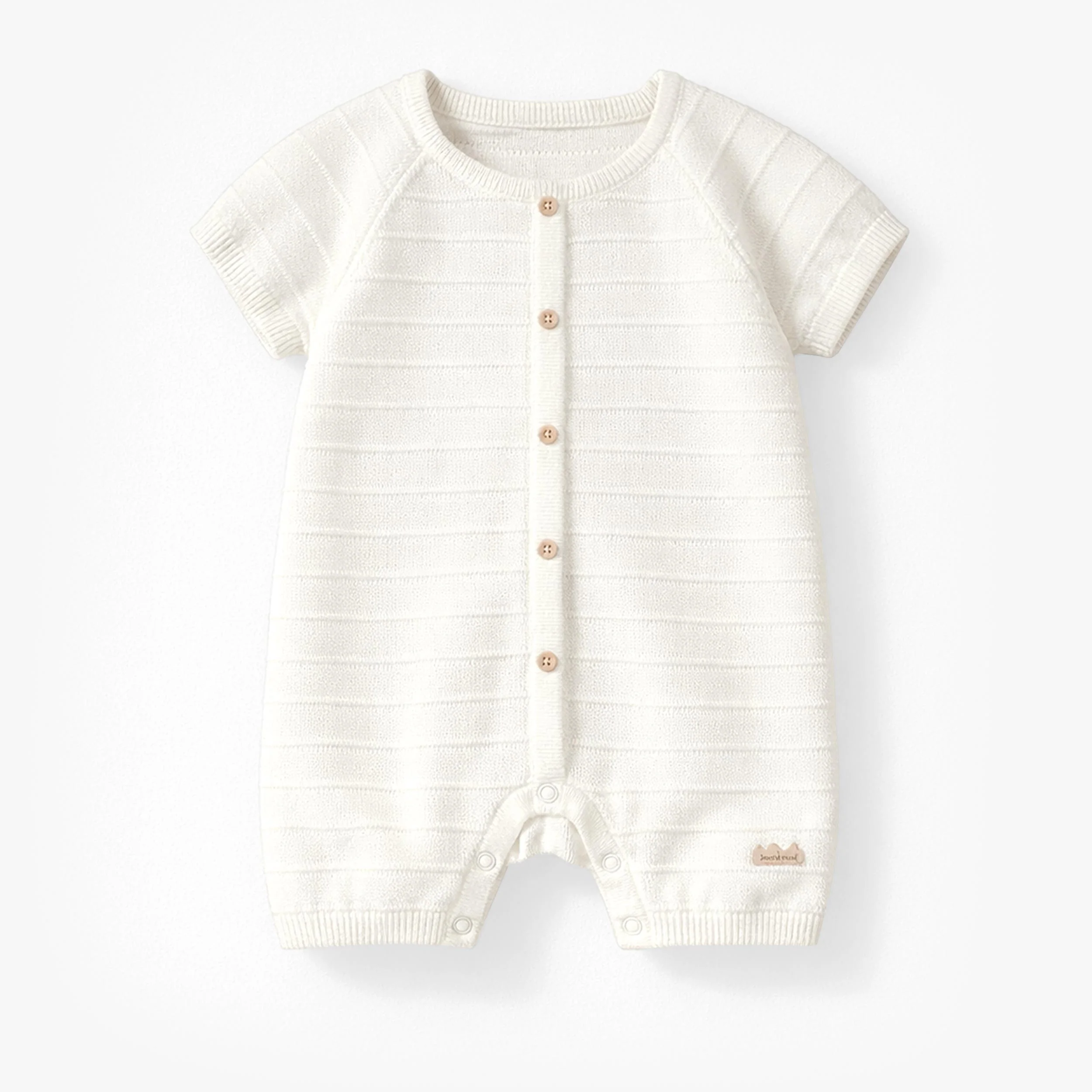 Barboteuse crème en tricot avec rayures, naissance
