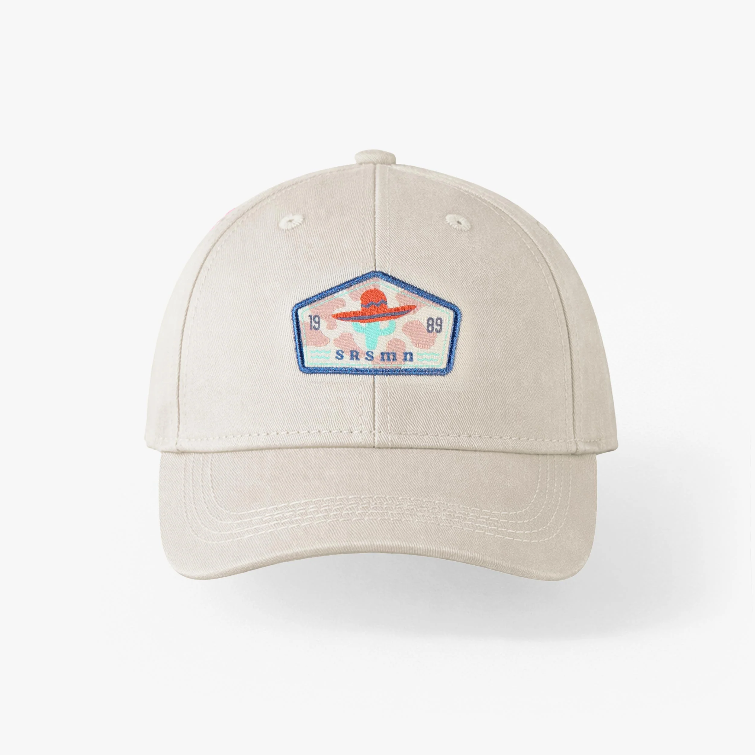 Casquette beige avec écusson, enfant
