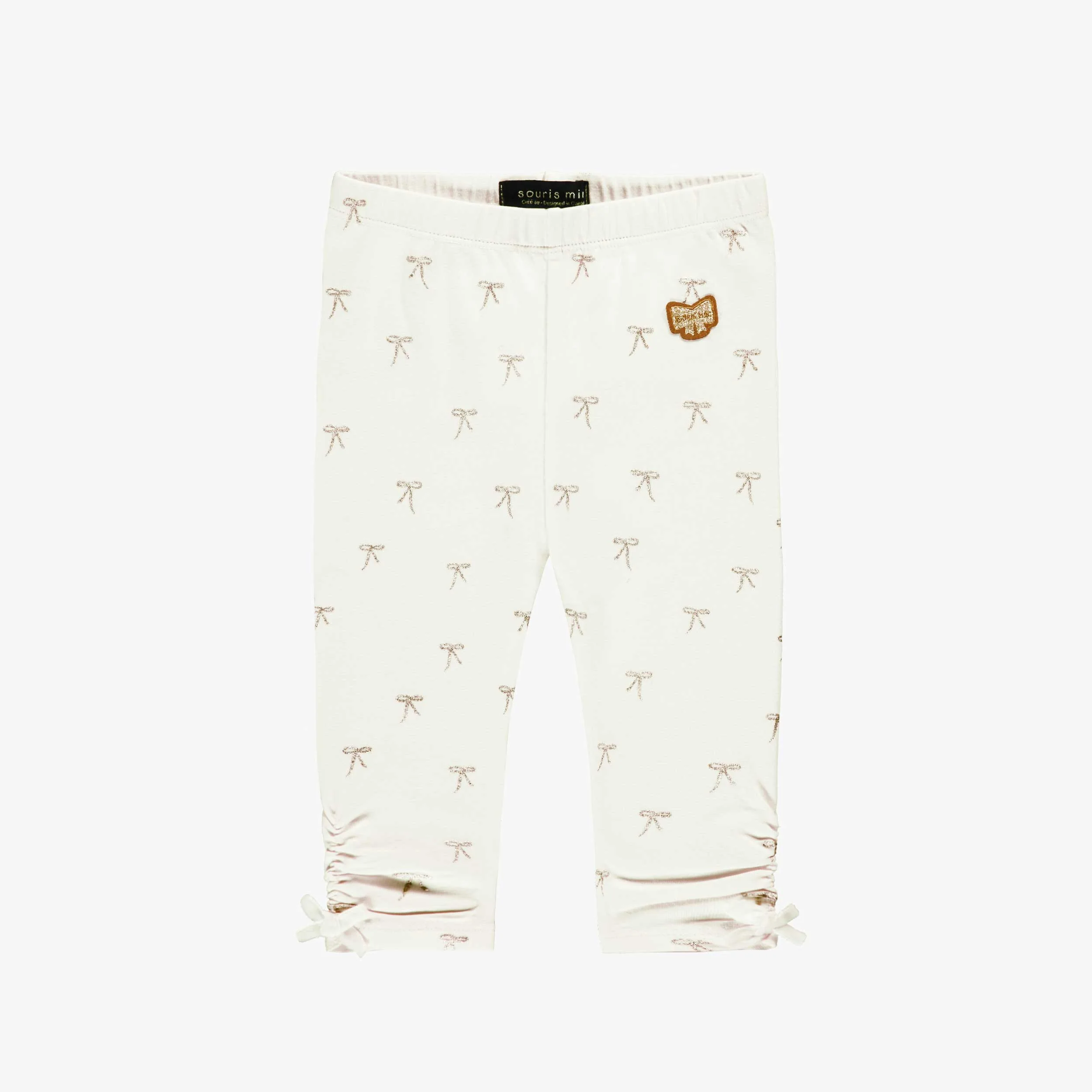 Legging crème avec motifs de boucles, bébé