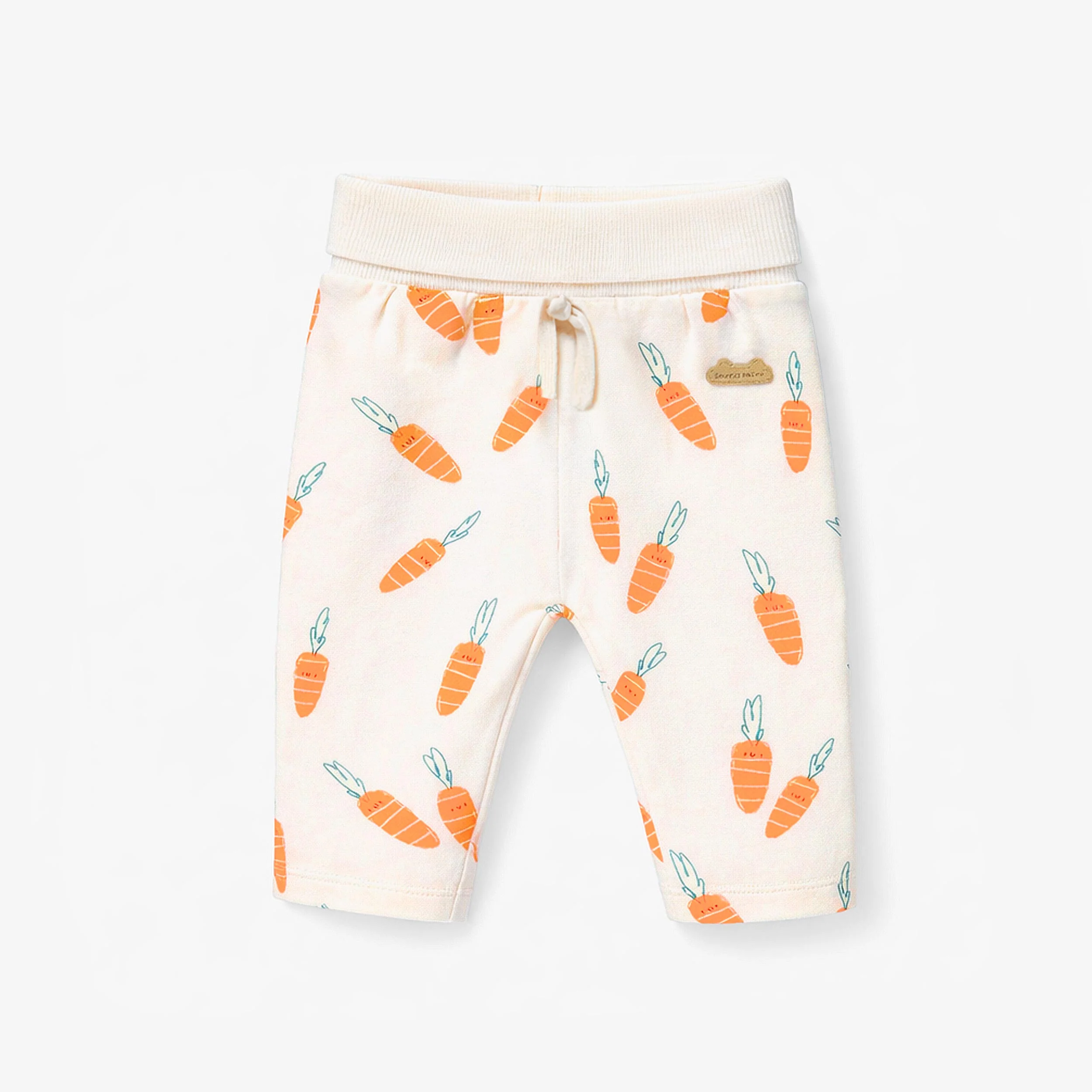 Pantalon crème à motifs de carottes, naissance