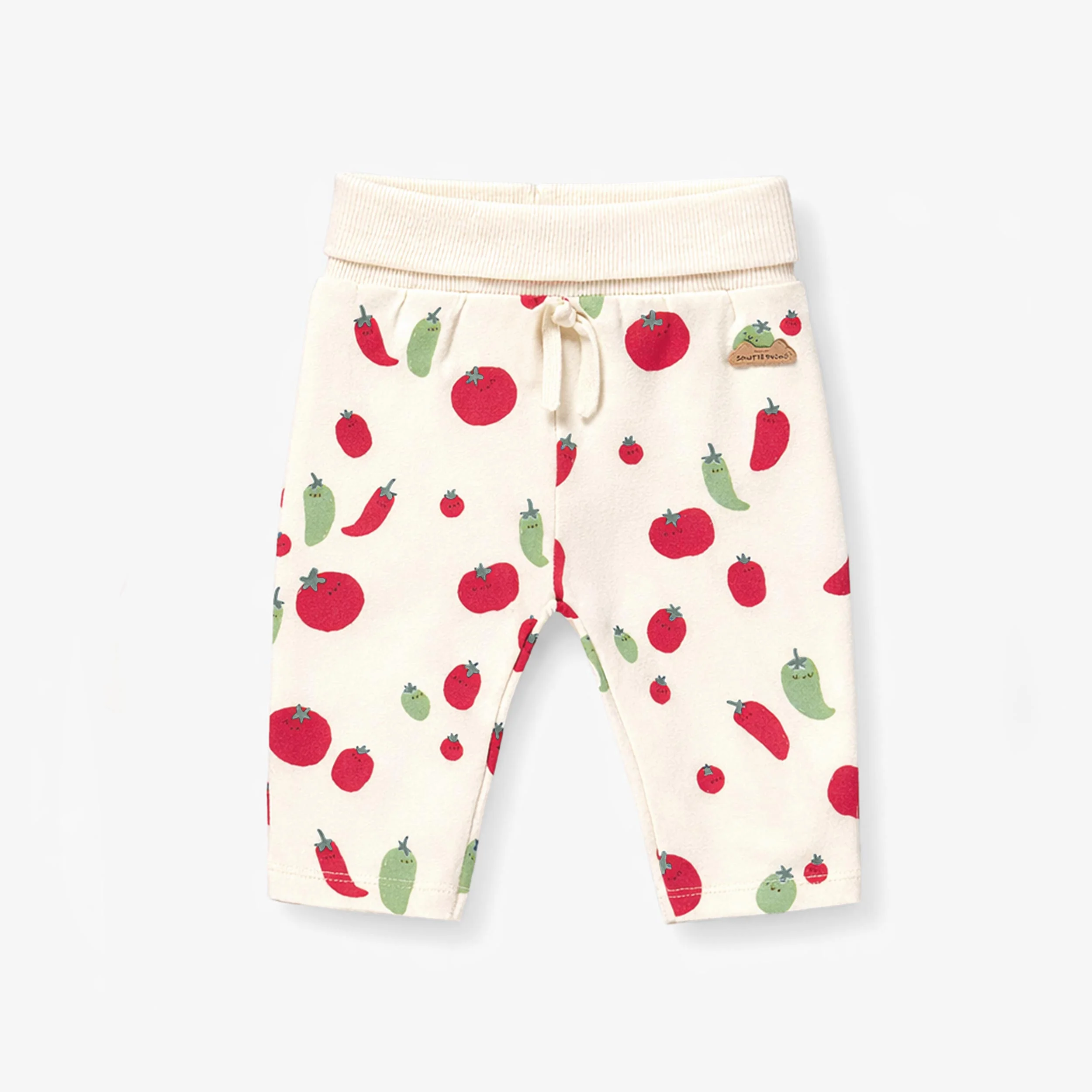 Pantalon crème à motifs de tomates et piments, naissance