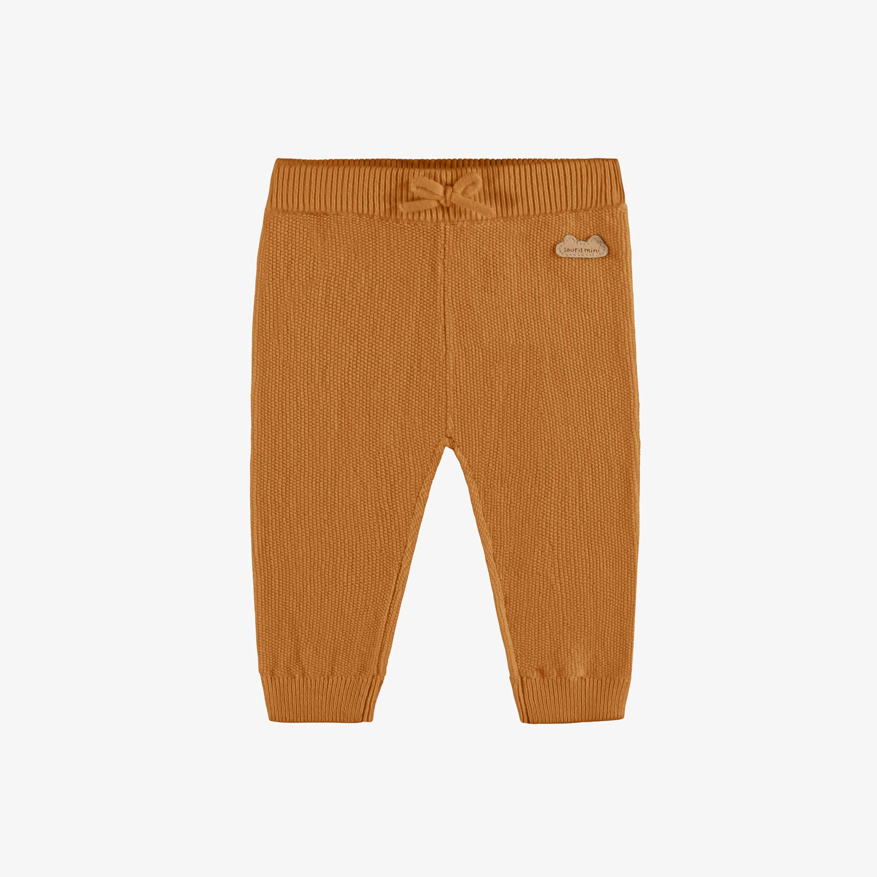 Pantalon de tricot orange naissance