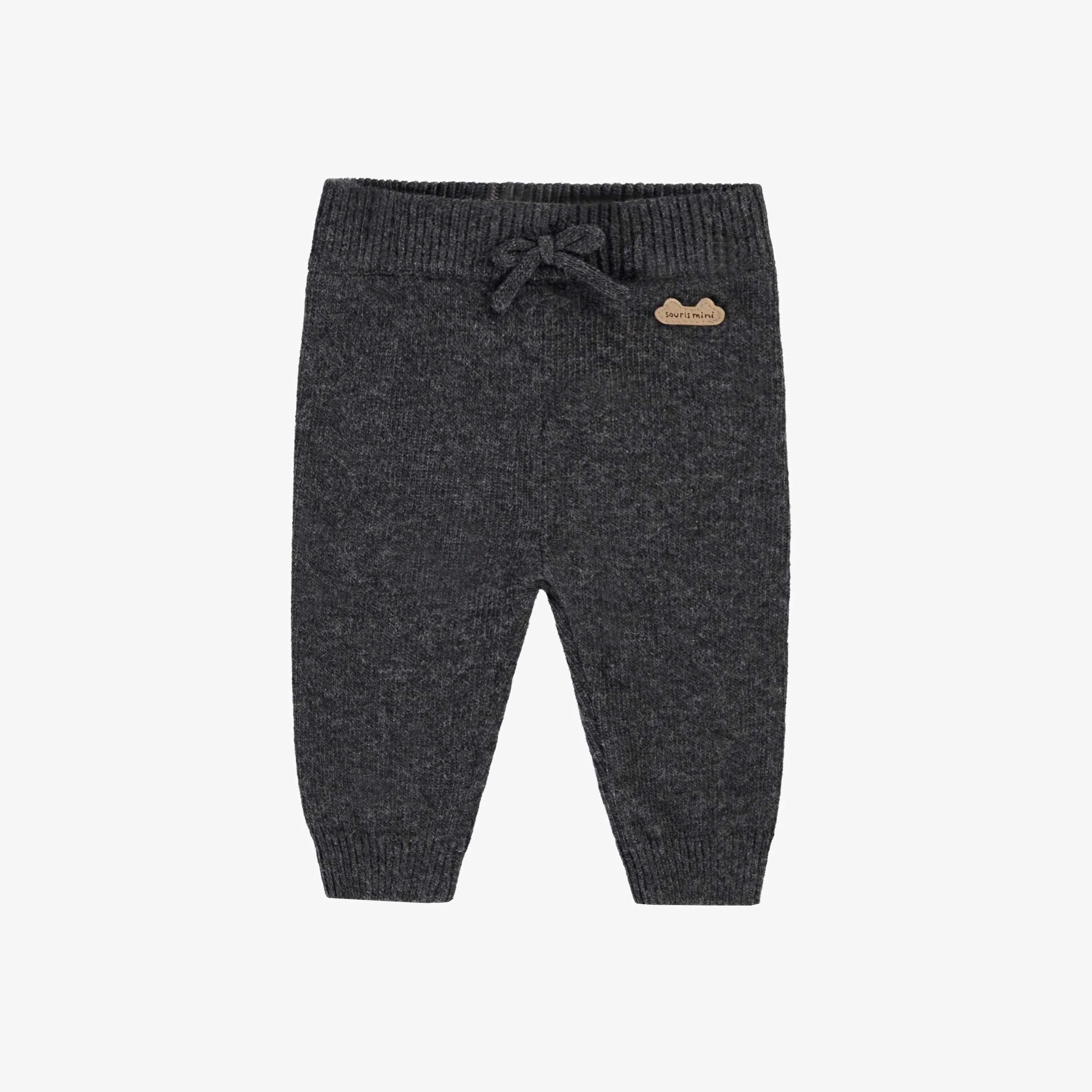 Pantalon gris en tricot, naissance