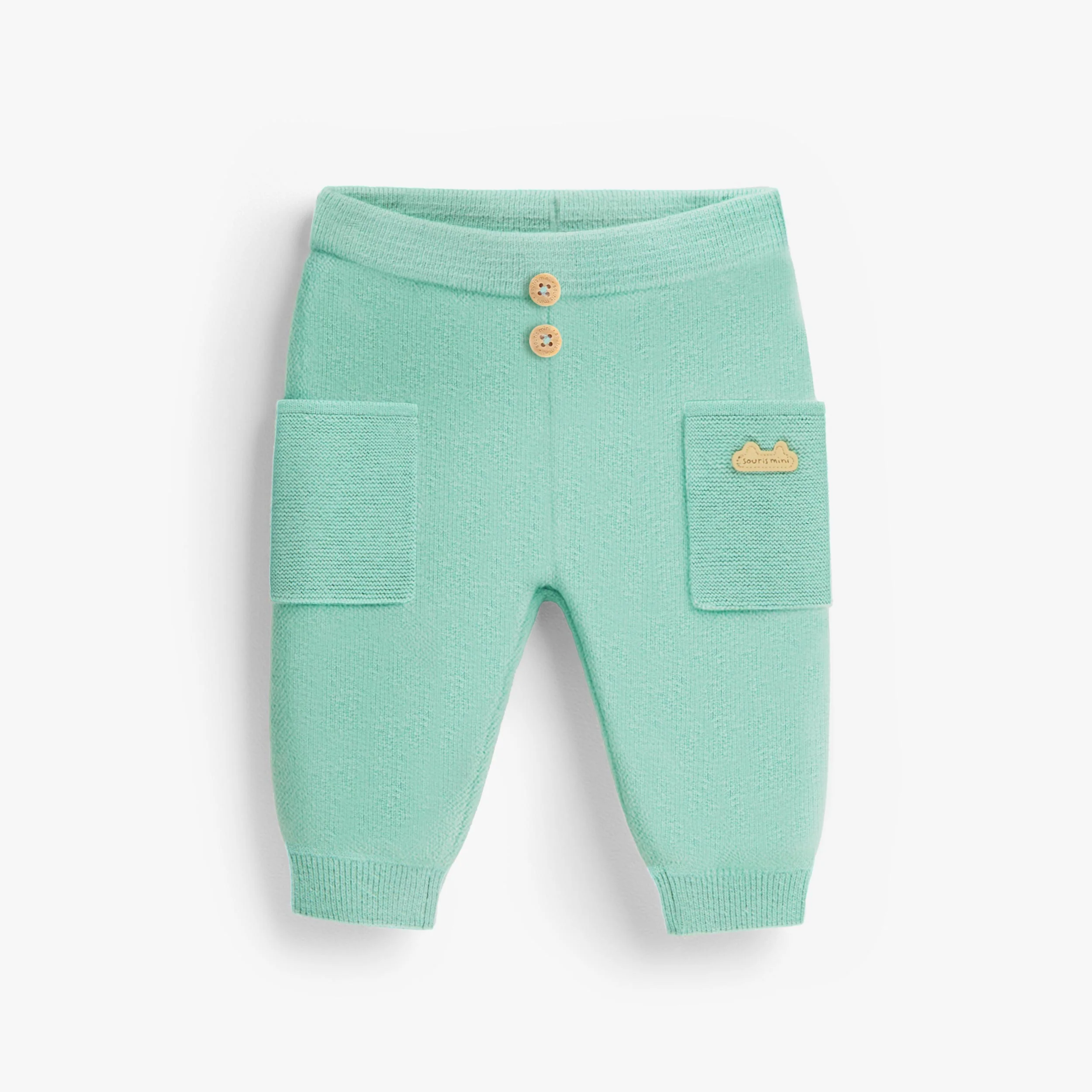 Pantalon turquoise en tricot, naissance