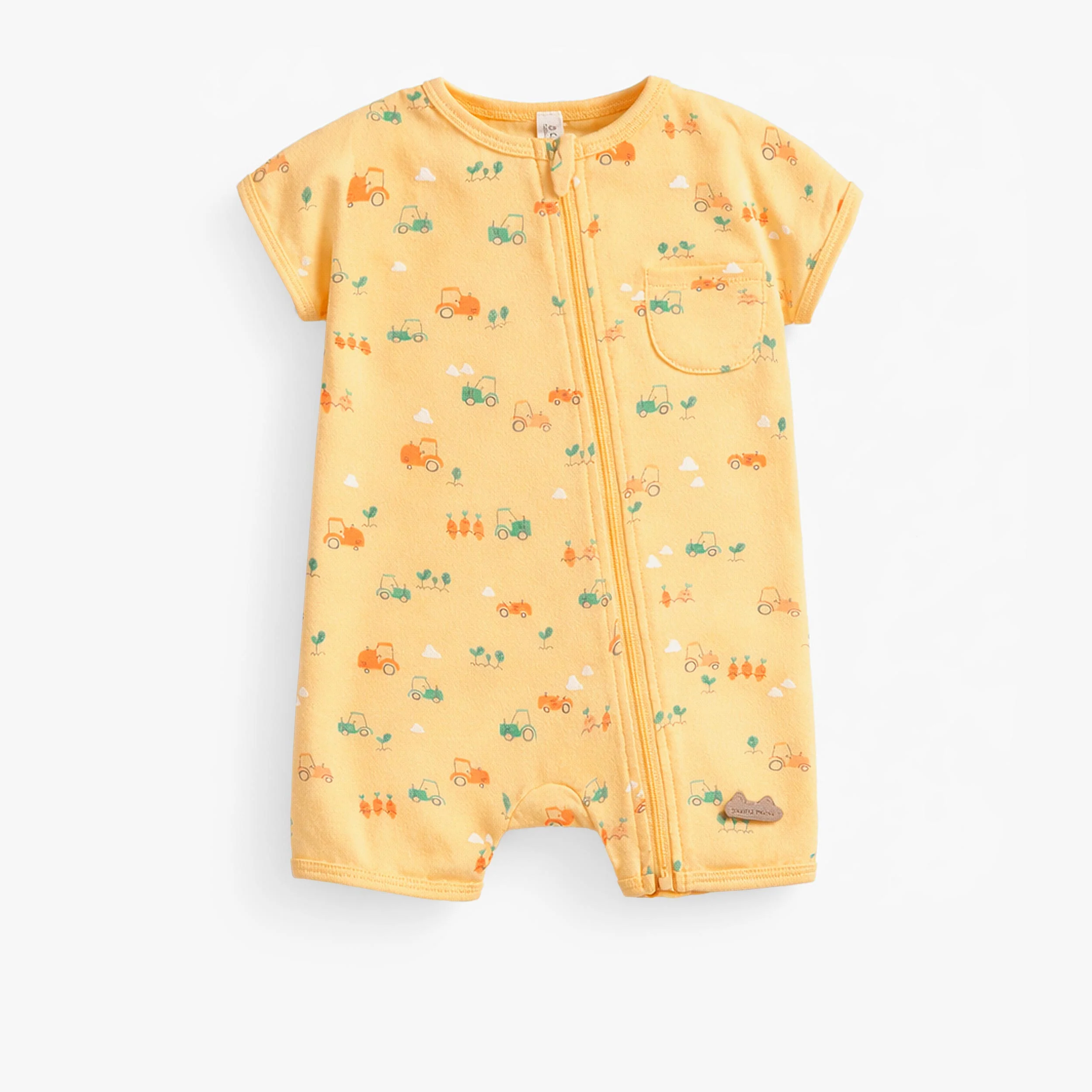 Pyjama une pièce jaune à motifs, naissance