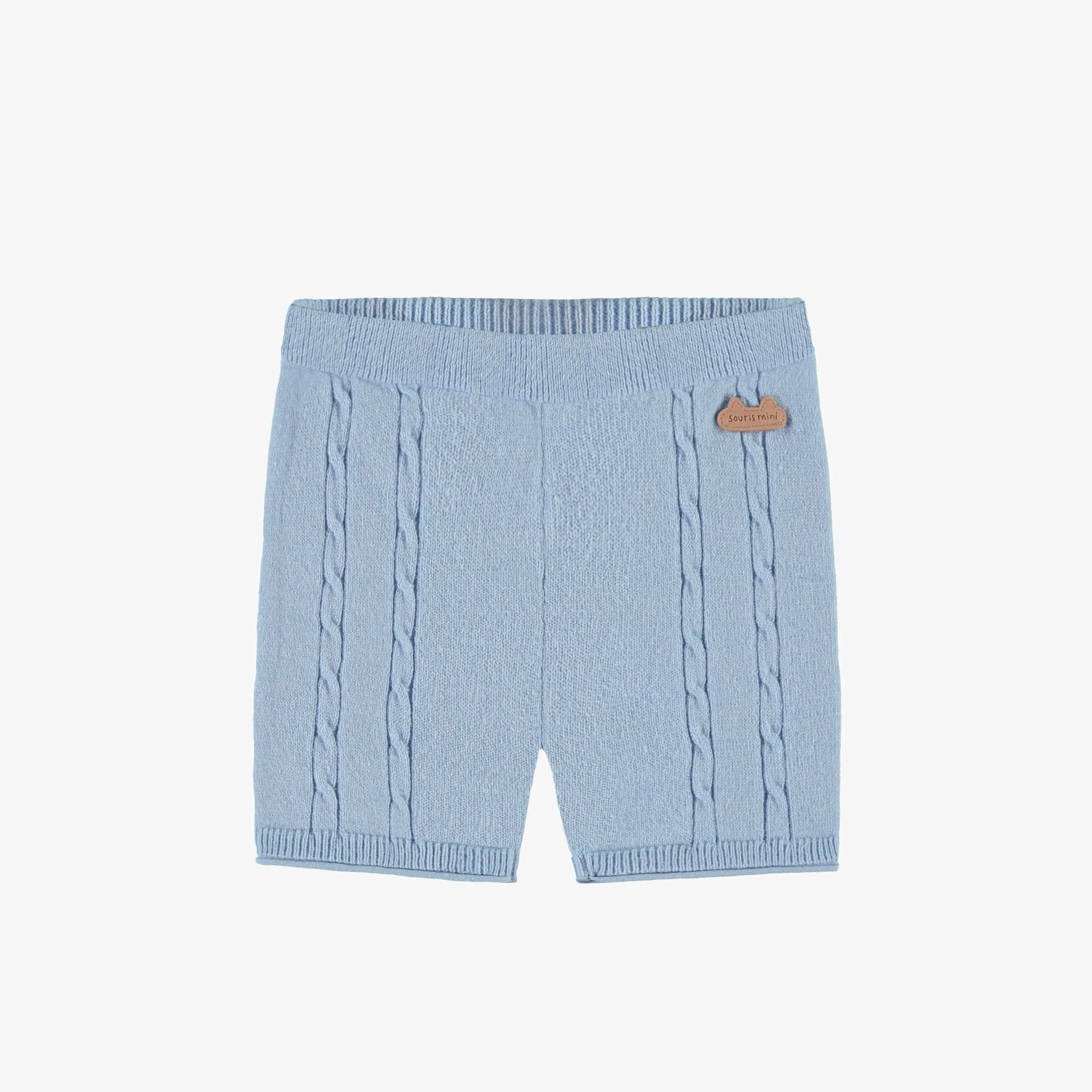 Short bleu pâle en tricot, naissance