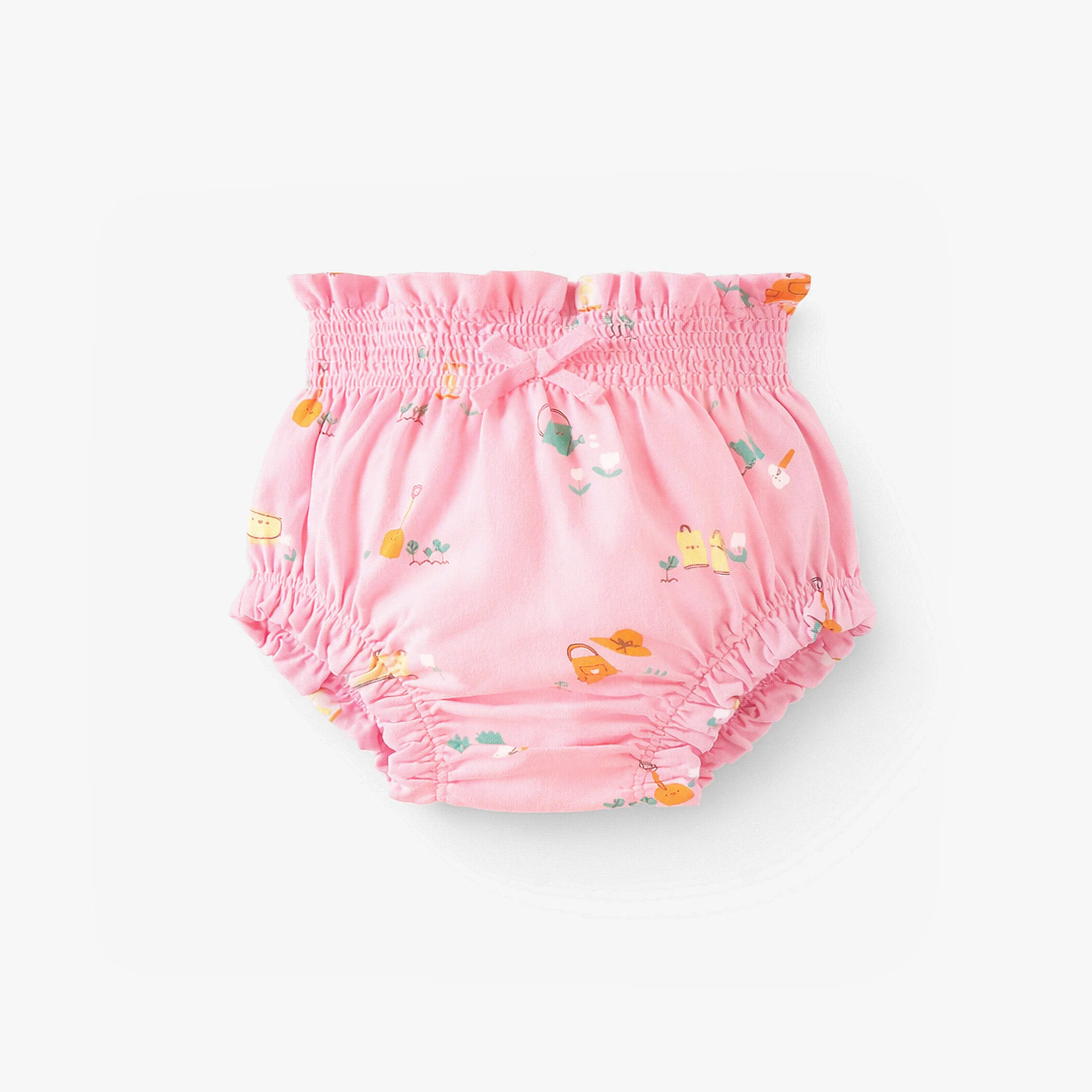 Short bouffant rose à motifs, naissance