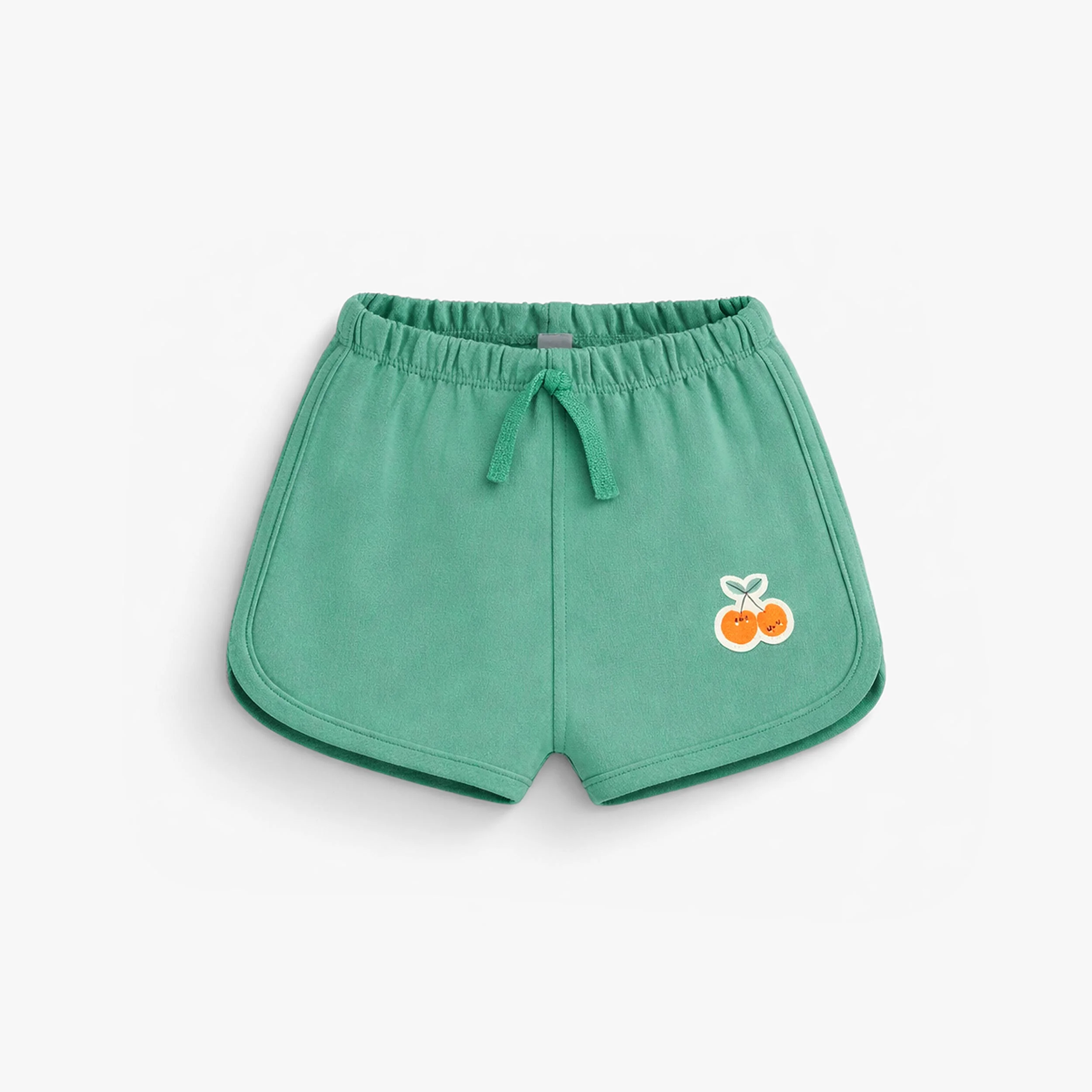 Short vert en coton français, naissance